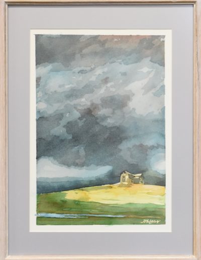 Watercolor painting of dark stormy sky over a little house on a green hill