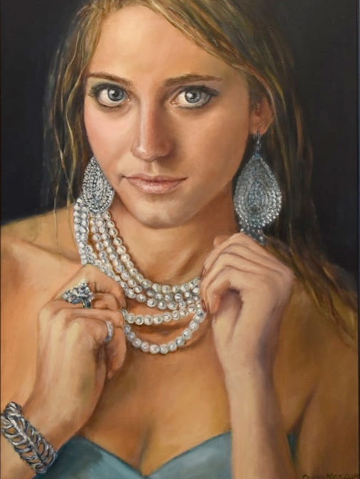 young woman with pearl necklace